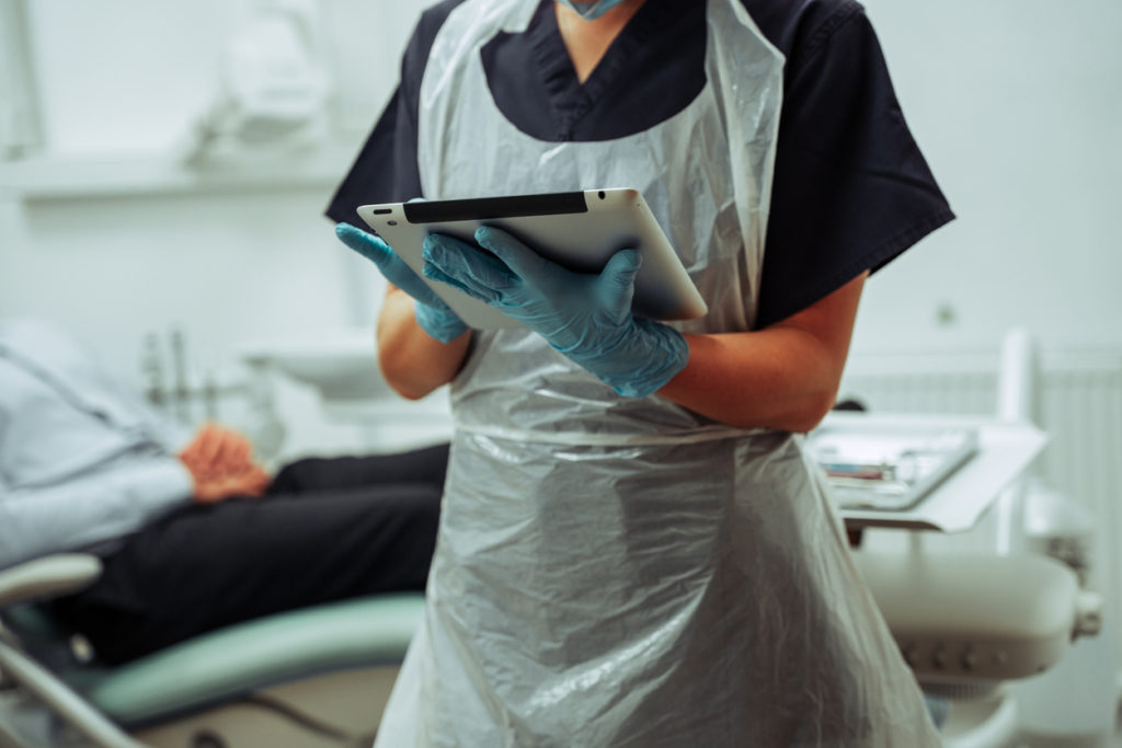 medical worker wearing a disposable apron