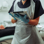 medical worker wearing a disposable apron